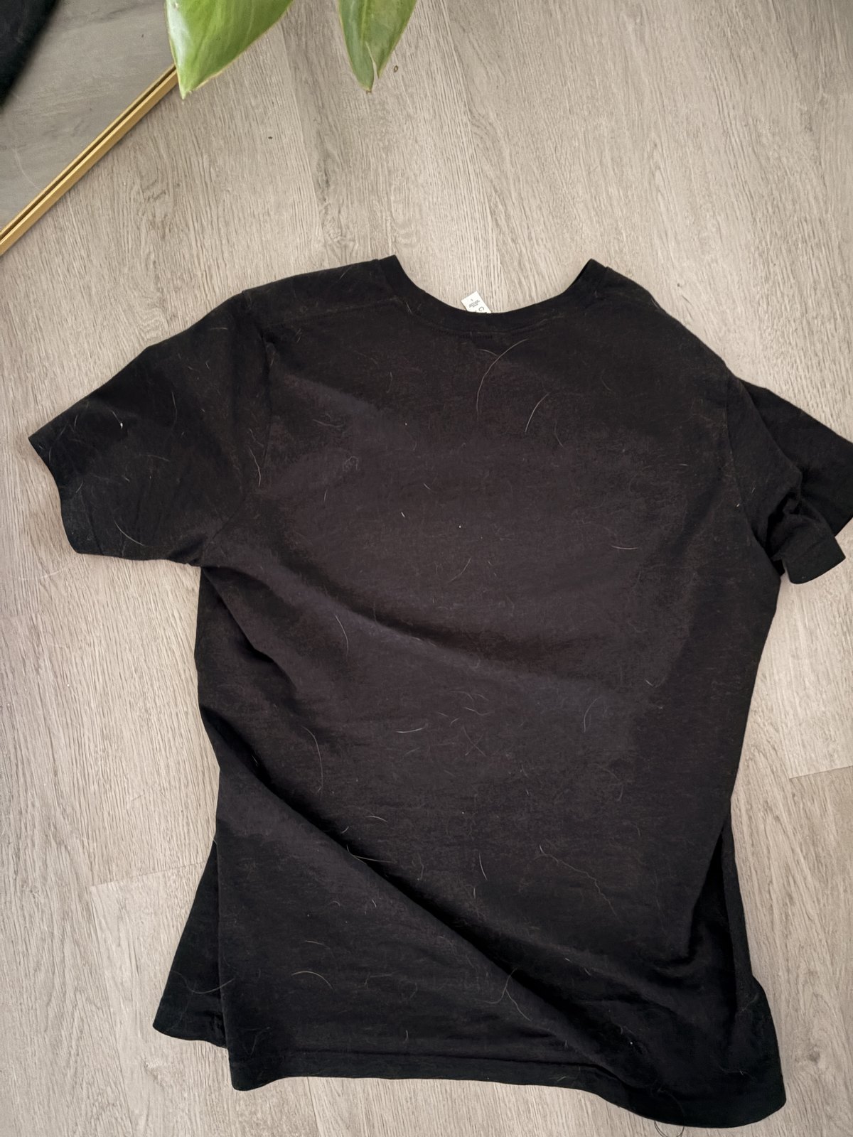 Close-up of the AI Made Humans Optional tee print